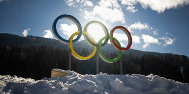 DIESE Ski-Legenden entzünden das Olympische Feuer