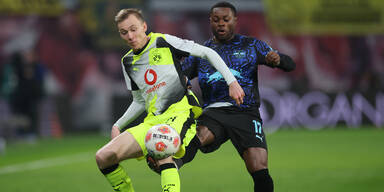 Bei Baumgartner-Doppelpack: Dortmund rettet spät Punkt gegen Leipzig