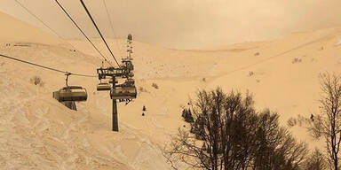 Orange Schnee Saharasand