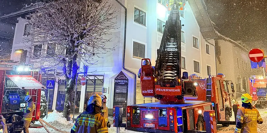 Feuer in Haus: 23 Bewohner gerettet